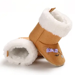 Bottines d'hiver marron pour bébé avec doublure en fausse fourrure blanche et nœud violet