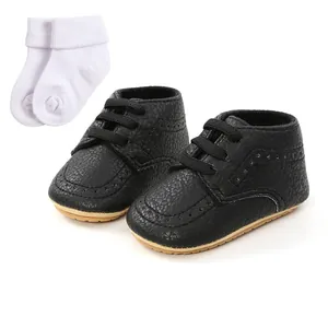 Set of black soft-sole infant toddler shoes and white cotton knit baby socks for 0-12 months