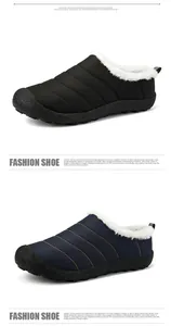 Detailansicht der gefütterten warmen Winter-Slipper-Stiefel in Schwarz und Blau.