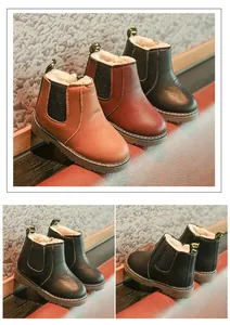 Detailed view of warm plush-lined children's snow boots in black, tan, and red PU leather.