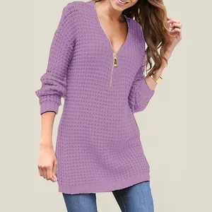 Detailed view of women's purple V-neck waffle knit sweater with front gold zipper closure