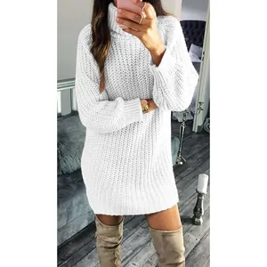Close-up detail of a cozy white turtleneck cable knit sweater dress with loose fit