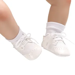 Elegant white glossy finish soft sole baby walking shoes for 0-1 year old infant boys and girls