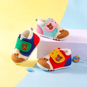 Vibrant breathable toddler walking shoes featuring cartoon bear and velcro straps