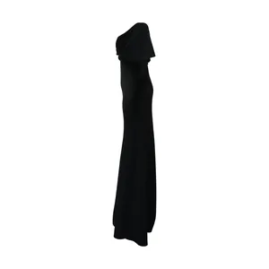 Detailed side view of an elegant black backless fishtail knit maxi evening gown