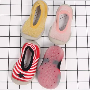 Detail view of breathable non-slip children's sock shoes showing different colors