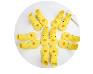 Yellow duck face baby walker shoes breathable non-slip floor socks arranged in a circle