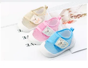 Breathable mesh baby walking shoes in beige, pink, and blue colors featuring a 3D cartoon bear.