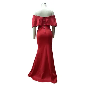Detailed back view of a red off-the-shoulder mermaid evening dress on a mannequin.