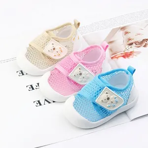 Breathable hollow mesh baby walking shoes with cute bear patches and soft non-slip soles
