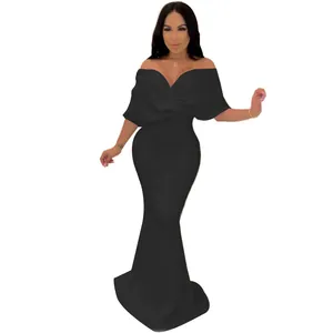 Close-up of an elegant black off-the-shoulder mermaid dress with a slim silhouette