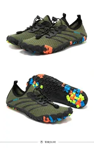 Close-up detail of olive green quick-dry water shoes with colorful non-slip sole