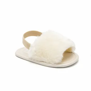 Detailed view of white fluffy baby sandals with elastic back strap for 0-1 year olds