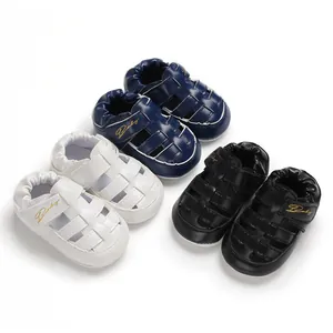 Detailed view of baby closed-toe sandals in white, navy blue, and black colors.