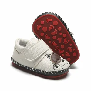 Chaussures de marche bébé blanches motif chien avec semelle souple antidérapante