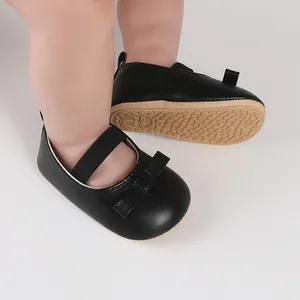Schwarze Lauflernschuhe für Baby-Mädchen mit Gummisohle und Schleife für 0-1 Jahre.