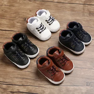 High-top leather baby walker shoes with soft soles in white, navy, black and brown colors