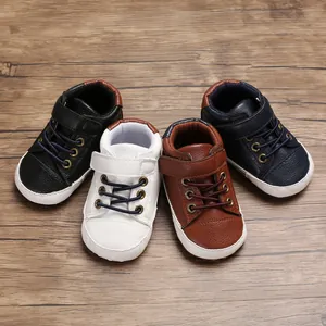 Detail view of high-top leather baby walker shoes in four colors with soft white soles