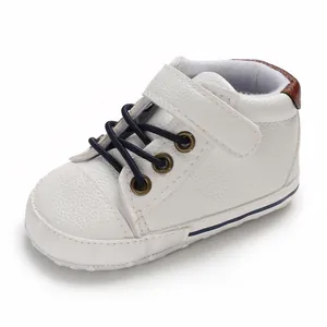 Detailed side view of white high-top leather baby walking shoes with flexible soft soles