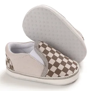 Detail of baby checkerboard slip-on walking shoes with soft anti-slip sole and canvas