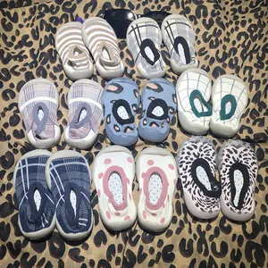 Collection of baby walker sock shoes with various patterns and soft anti-slip soles