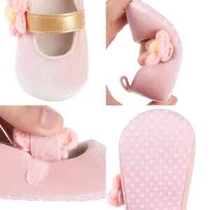 Pink velvet baby girl walking shoes with decorative flower and soft anti-slip sole