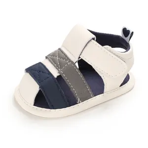 Detailed view of baby soft sole summer sandals in navy blue, white and grey color combo