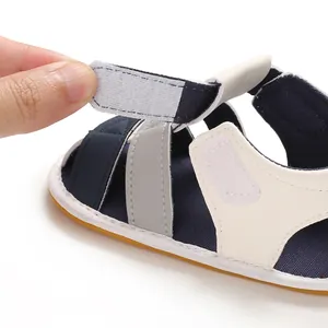 Detailed close-up of baby summer sandal featuring a secure hook-and-loop fastener strap