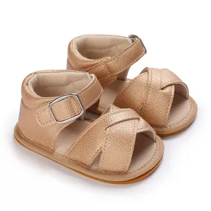 Close-up view of rose gold baby girl summer sandals with soft rubber non-slip soles