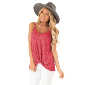 Close-up showing the red sleeveless tank top with stylish twist knot hem design