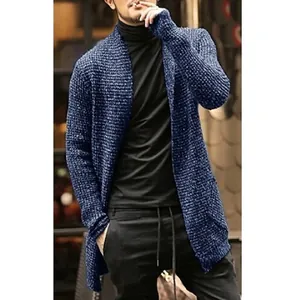 Detail view of men's stylish blue knitted long cardigan jacket styled with turtleneck