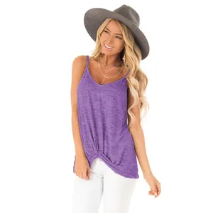 Macro view of the purple sleeveless top showing the textured fabric and twist-knot detail.