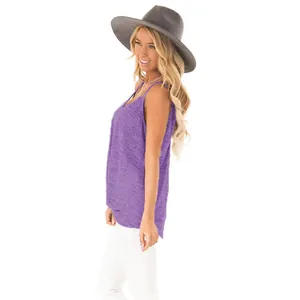 Side view of a purple sleeveless camisole with twist knot detail on a female model