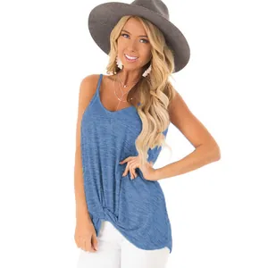Detail view of a blue sleeveless camisole with front knot detail worn by a model