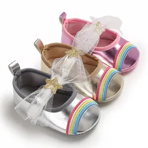 Detailed view of baby girl princess shoes in pink gold and silver metallic colors