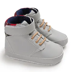 Detailed view of grey high-top soft sole baby walker shoes for infants 0-1 year old.