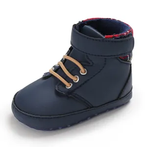 Close-up of navy blue high-top baby walking shoes with soft sole for 0-1 year old infants