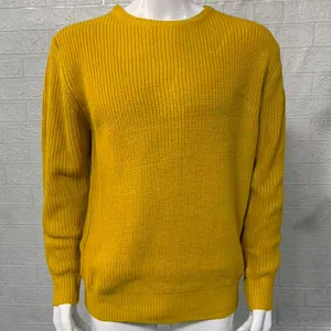 Close-up detail of a mustard yellow knitted men's crewneck pullover sweater texture
