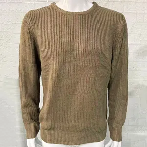 Detail shot of men's slim fit knitted pullover sweater in olive brown on mannequin