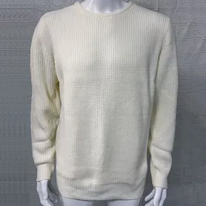 Detail view of premium white men's slim fit cable knit crew neck pullover sweater