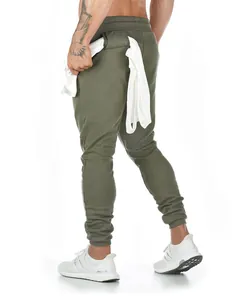 Detailed back view of men's slim fit olive green cotton joggers showing fabric and fit