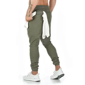 High-quality men's olive green athletic gym joggers cotton sweatpants shown from the back view