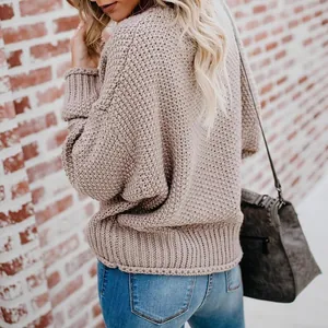Chunky loose-knit V-neck sweater for women in cozy taupe, perfect for casual outdoor wear