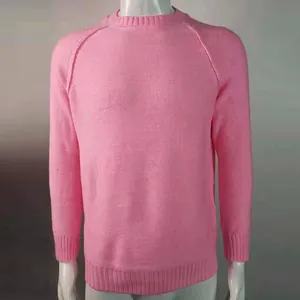 Elegant men's soft pink crew neck long sleeve knitted sweater displayed on a mannequin