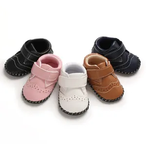 Detailed view of baby toddler shoes in various colors with non-slip rubber soles
