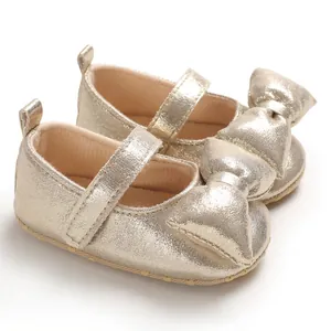 Elegant baby girl gold metallic princess shoes with large bow and soft anti-slip sole for infants