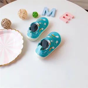 Blue toddler slip-on canvas shoes with rainbow and cloud patterns for boys and girls.
