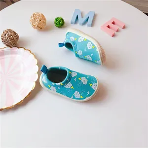 Detailed view of blue toddler walking shoes featuring a cute cloud and lightning pattern