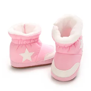 Bottes de neige roses pour bébé avec motif d'étoile blanche et doublure en fausse fourrure