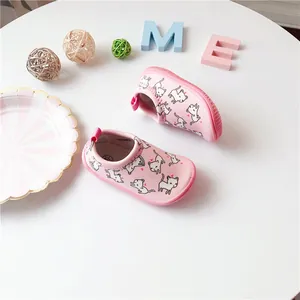 Comfortable pink toddler slip-on canvas shoes featuring cute cartoon cat patterns